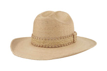 Load image into Gallery viewer, Beige straw hat with a western brim and decorative band on a white background