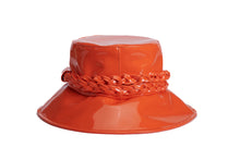 Load image into Gallery viewer, A glossy orange bucket hat with a wide brim and a braided orange band around the crown, shown on a plain white background. Back