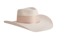 Load image into Gallery viewer, A cream-colored cowboy hat with a matching fabric band wrapped around the crown, shown against a plain white background.