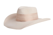 Load image into Gallery viewer, A cream-colored cowboy hat with a matching fabric band wrapped around the crown, shown against a plain white background. Side