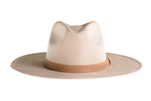 Suede hat with the crown shaped into a clean and ridged design with a double synthetic suede tan trim, front view