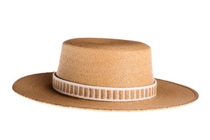 Straw hat made of palm leaves in tan color completed with a rustic cotton and jute trim, right side view
