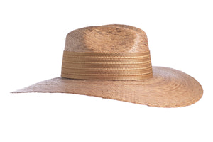 Hat with palm leaves in tan color finished with a golden trim, right side view