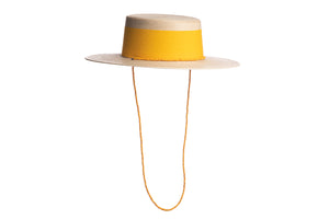 Wide tan brim palm hat with a yellow wide cotton trim and a yellow beaded chain, right side view