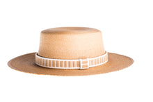 Load image into Gallery viewer, Straw hat made of palm leaves in tan color completed with a rustic cotton and jute trim, left side view
