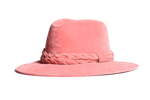 Hat swathed of rich pink velour fabric with a stiffened peaked crown and a pink double braid trim, left side view