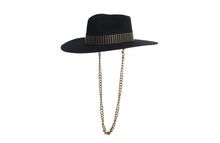 Load image into Gallery viewer, Black hat composed of the finest wool, it has an elegant structured crown, finished with a studded trim that defines the body of the hat. It comes with a detachable gold chain, left side view