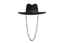 Load image into Gallery viewer, Black hat composed of the finest wool, it has an elegant structured crown, finished with a studded trim that defines the body of the hat. It comes with a detachable gold chain, back view