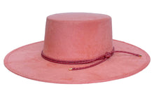 Load image into Gallery viewer, Vegan suede hat in pink color with a cordobes style and finished with a statement double braid, left side view
