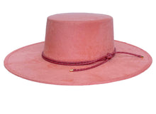 Load image into Gallery viewer, Vegan suede hat in pink color with a cordobes style and finished with a statement double braid, left side view