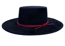 Load image into Gallery viewer, Cordobes hat composed of vegan suede navy blue color and with a red double braid, left side view
