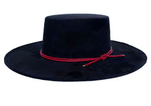 Load image into Gallery viewer, Cordobes hat composed of vegan suede navy blue color and with a red double braid, left side view