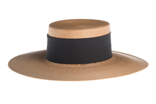 Load image into Gallery viewer, Straw hat tan color made of palm leaves and secured with a wide cotton trim and crisscross design, left side view
