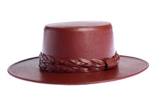 Load image into Gallery viewer, Cordobes hat in cherry color crafted with an innovative metallic vegan leather made from nopal, finished with double braided trim, left side view

