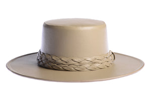Cordobes hat in tan color crafted with an innovative metallic vegan leather made from nopal, finished with double braided trim, front view