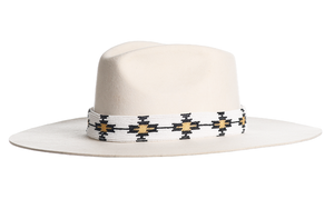 Wool hat in white with an elegant structured crown, finished with a fine hand embroidered beaded trim, left side view