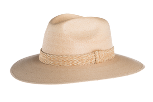 Straw hat in natural color interlaced with palm leaves and with a rustic cotton braided trim, left side view