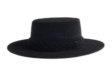 Load image into Gallery viewer, Cordobes hat composed of soft velour fabric in deep black with a matching statement double braid, left side view