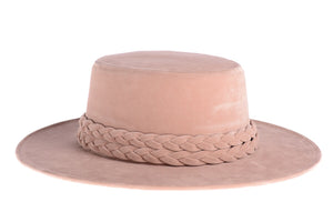 Soft pink hat composed of soft velour fabric with a double braid, right side view