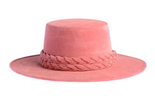 Load image into Gallery viewer, Cordobes hat composed of vibrant pink felt and with a statement double braid, front view
