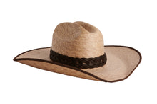 Load image into Gallery viewer, A natural straw cowboy hat with a dark brown braided band, shown from a side angle on a plain white background.
