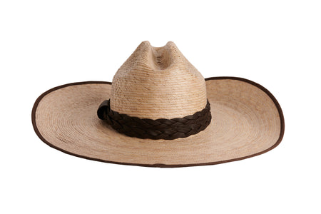A natural straw cowboy hat with a dark brown braided band, shown from a side angle on a plain white background.