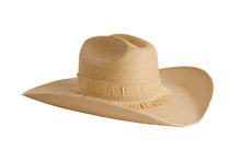 Load image into Gallery viewer, A light tan woven straw cowboy hat with a wide brim, a tall crown, and a decorative fringed band, shown against a plain white background.
