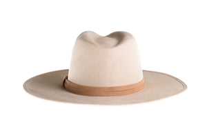 Suede hat with the crown shaped into a clean and ridged design with a double synthetic suede tan trim, back view