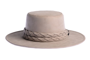 Smokey grey hue cordobes hat made of vegan leather and finished with a statement double braid, front view