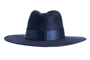 Deep blue suede hat made of polyester with a stiffened crown and shaped into a clean and ridged design which comes with an elastic silk trim, back view