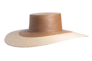 Elegant straw hat and flawlessly finished with a light tone brim interlaced with palm leaves to create the finished design, left side view