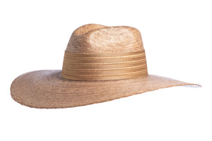 Hat with palm leaves in tan color finished with a golden trim, left side view