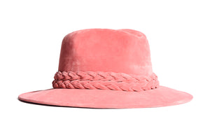 Hat swathed of rich pink velour fabric with a stiffened peaked crown and a pink double braid trim, right side view