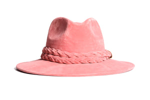 Hat swathed of rich pink velour fabric with a stiffened peaked crown and a pink double braid trim, front view