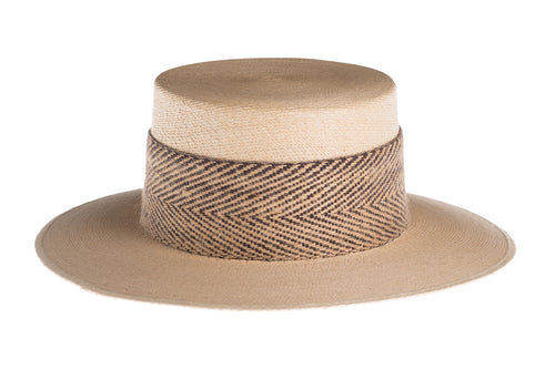 Straw hat made of Palm leaf in a natural color finished with a dual textured trim and criss-cross detail, front view