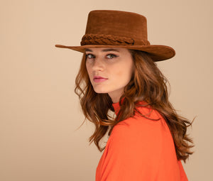 Girl wearing a brown hat classic Spanish Cordobes style