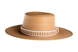Straw hat made of palm leaves in tan color completed with a rustic cotton and jute trim, front view