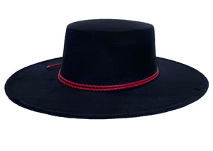 Cordobes hat composed of vegan suede navy blue color and with a red double braid, right side view