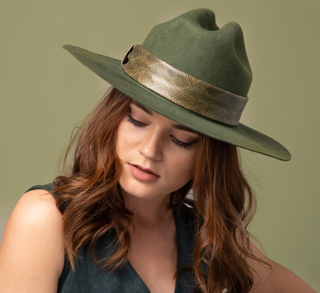 Girl wearing an olive green hat