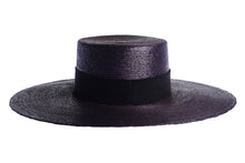 Load image into Gallery viewer, A black woven straw boater hat with a wide brim and a black ribbon band, shown against a plain white background. Back side
