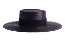 Load image into Gallery viewer, A black woven straw boater hat with a wide brim and a black ribbon band, shown against a plain white background. Front side
