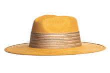 Load image into Gallery viewer, Suede hat mustard color stiffened and shaped into a clean and ridged design, finished with a thick gold elastic trim, left side view
