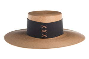 Straw hat tan color made of palm leaves and secured with a wide cotton trim and crisscross design, back view