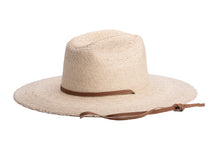 Load image into Gallery viewer, A natural straw cowboy hat with a brown leather band and matching chin strap, shown on a plain white background. Left side
