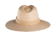 Load image into Gallery viewer, Straw hat in natural color interlaced with palm leaves and with a rustic cotton braided trim, back view
