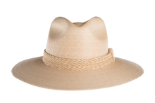 Load image into Gallery viewer, Straw hat in natural color interlaced with palm leaves and with a rustic cotton braided trim, front view

