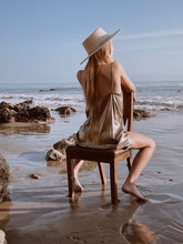 Load image into Gallery viewer, Girl in the beach posing with a white suede hat
