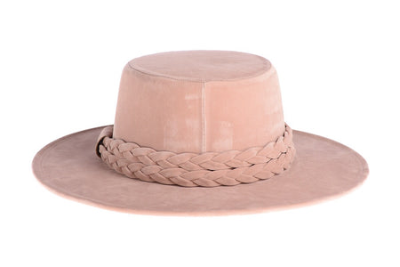 Soft pink hat composed of soft velour fabric with a double braid, back view