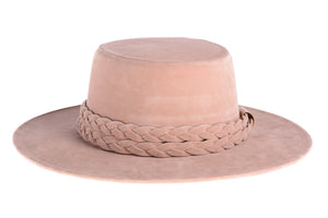 Soft pink hat composed of soft velour fabric with a double braid, front view