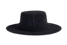 Load image into Gallery viewer, Cordobes hat composed of soft velour fabric in deep black with a matching statement double braid, back view
